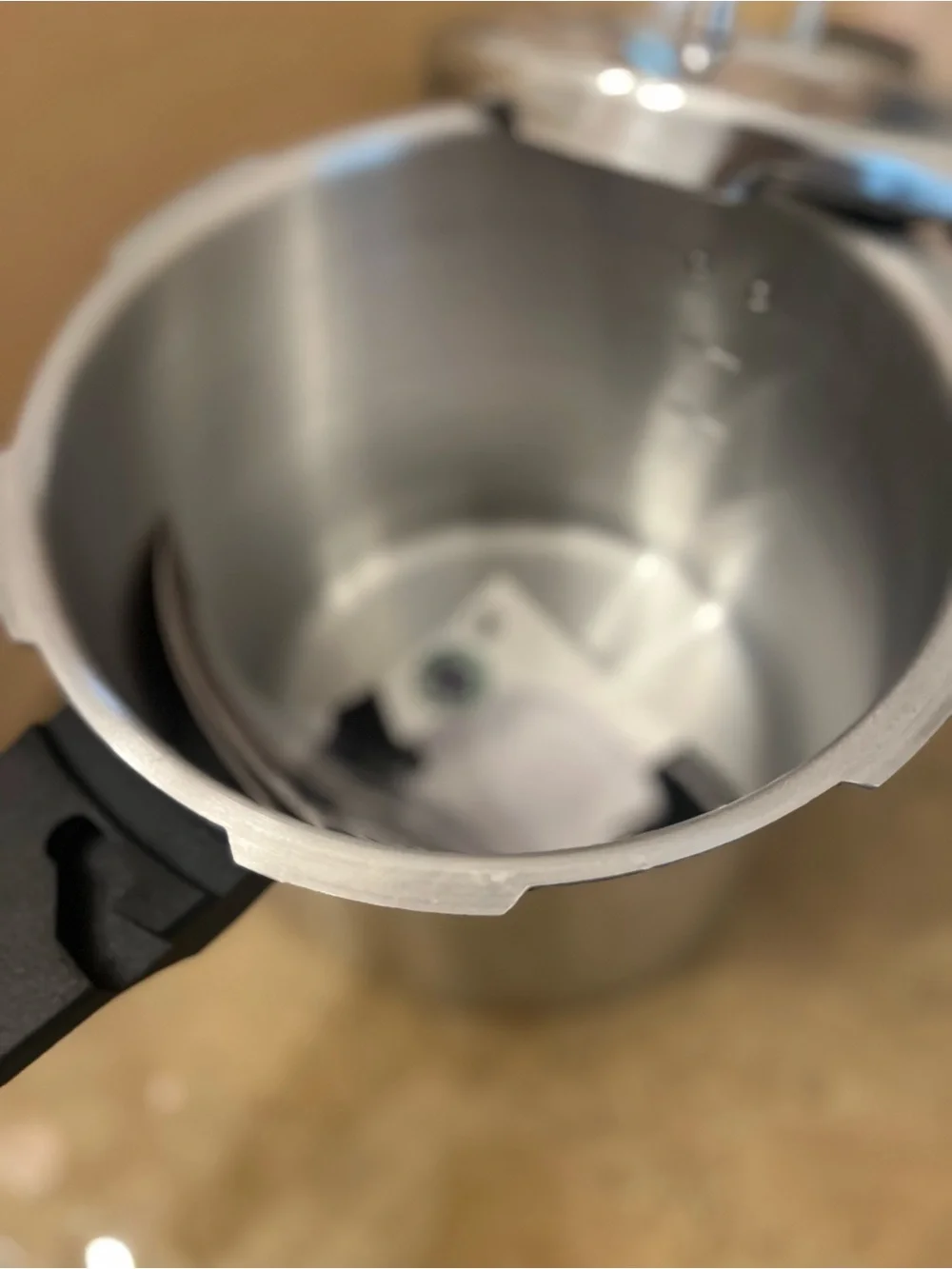 New - 6 Quart Stainless Steel Pressure Cooker with Black Handles